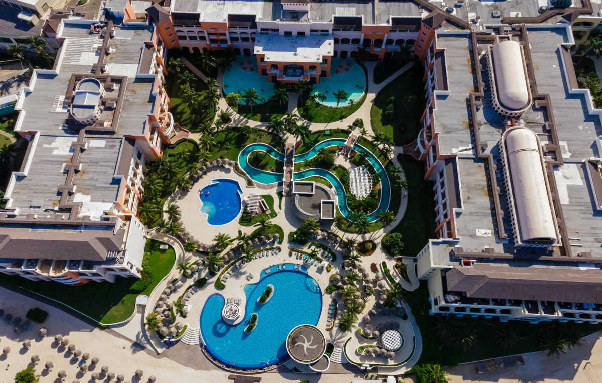 A sunlit oasis glowing with turquoise water and peaceful resort charm.