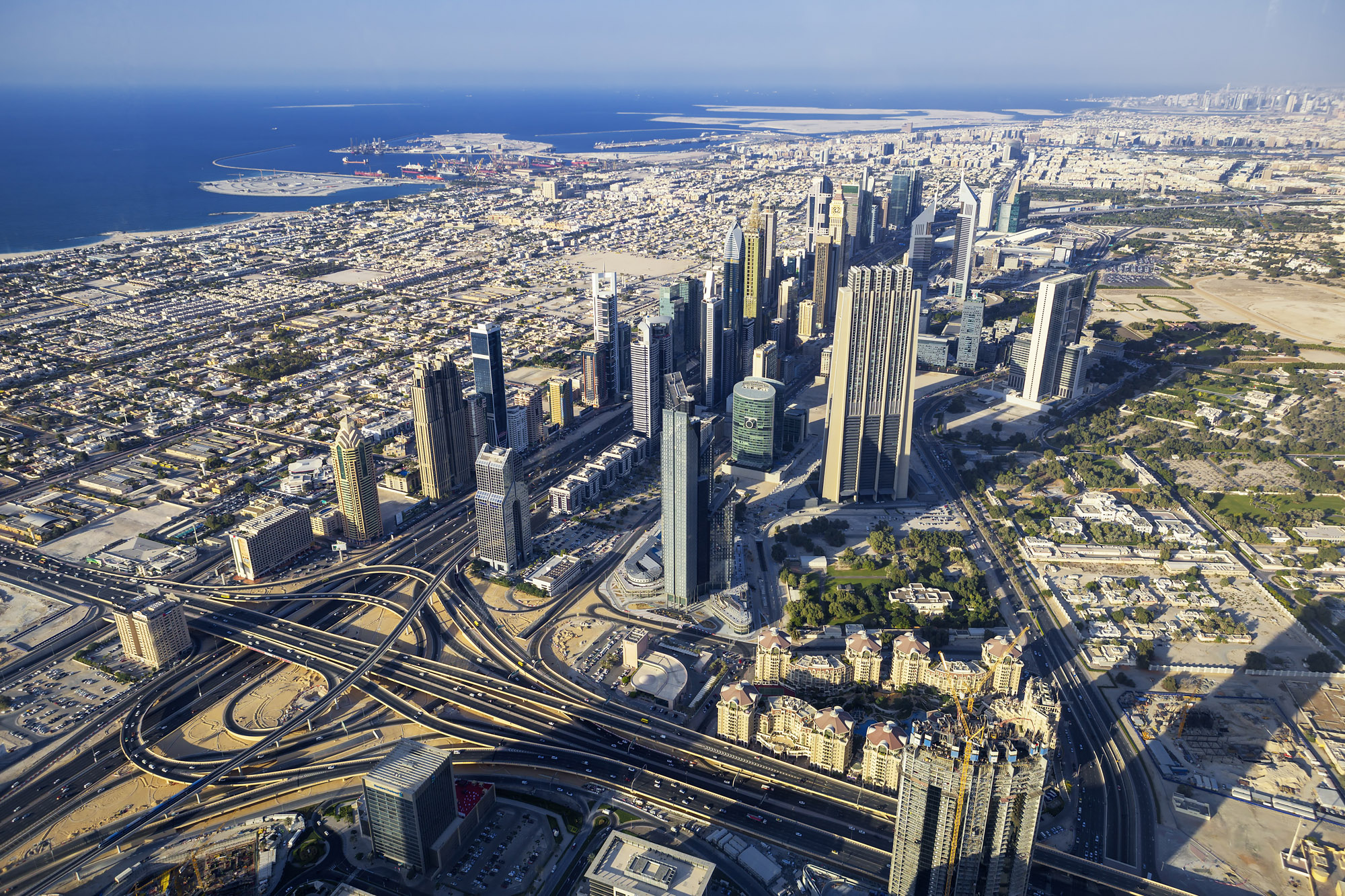 Aerial skylinealong the tall buildings and long roads.