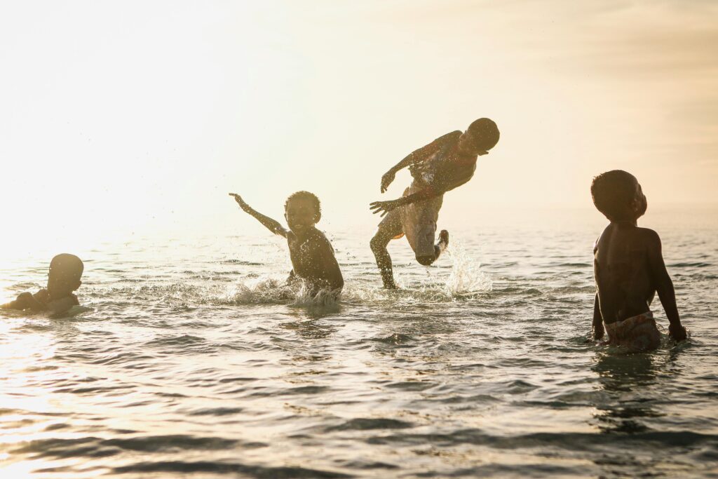 children enjoying in water
